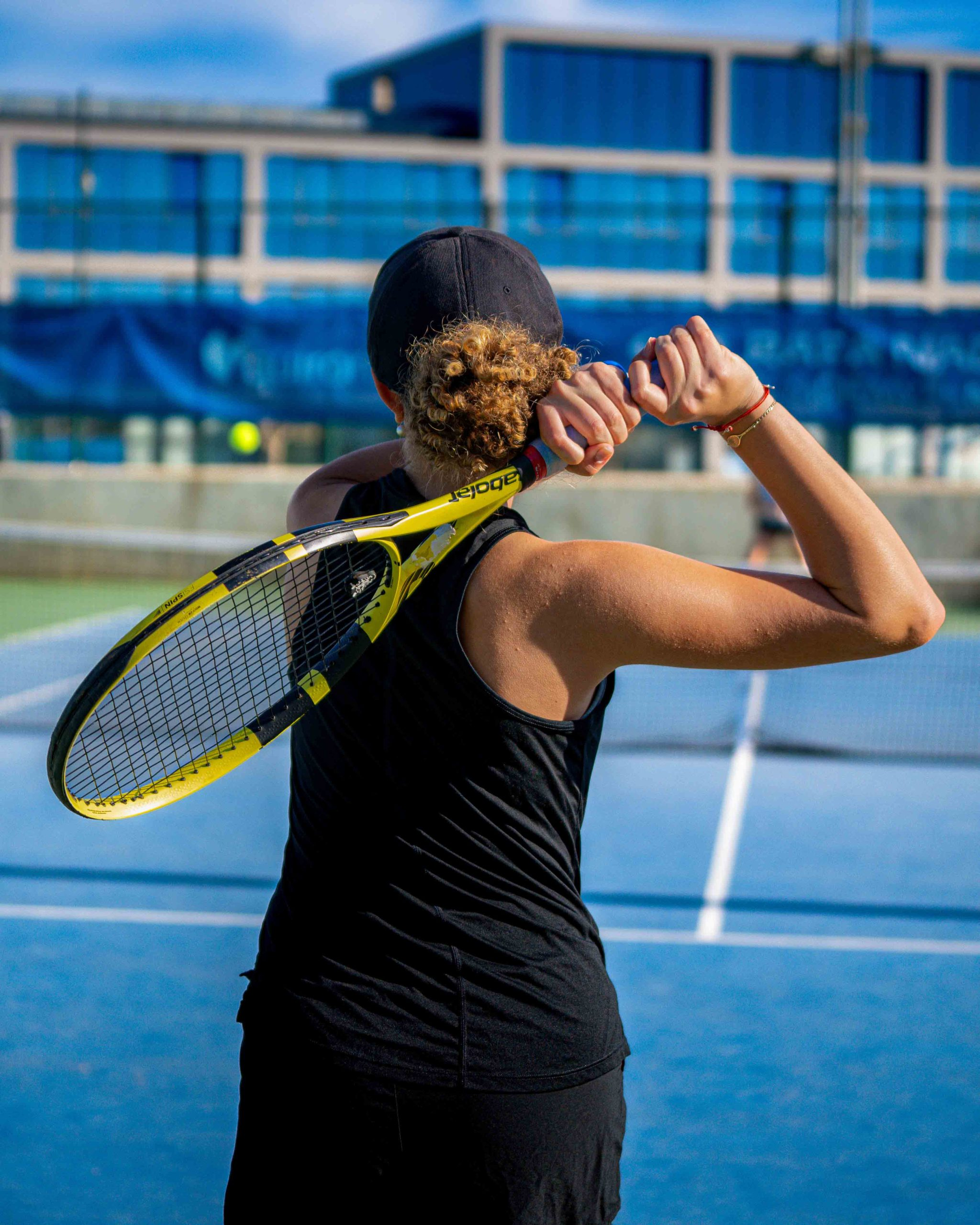 Adult tennis player on court